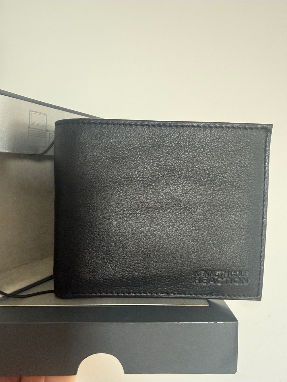 Kenneth Cole Reaction Black Leather Bifold Wallet with Embossed Logo